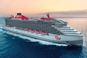 image of the Valiant Lady ship cruising through the deep blue waters